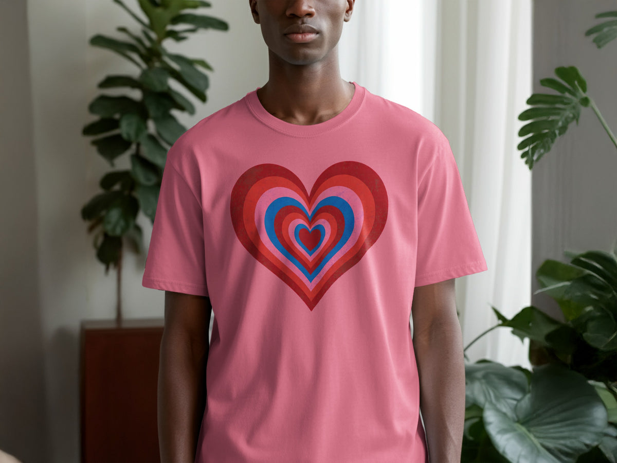 Pink t-shirt with a concentric heart graphic in red, pink, and blue.