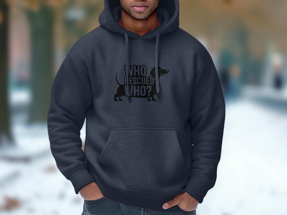 Dark gray hoodie with black dachshund graphic and text "WHO RESCUED WHO?".