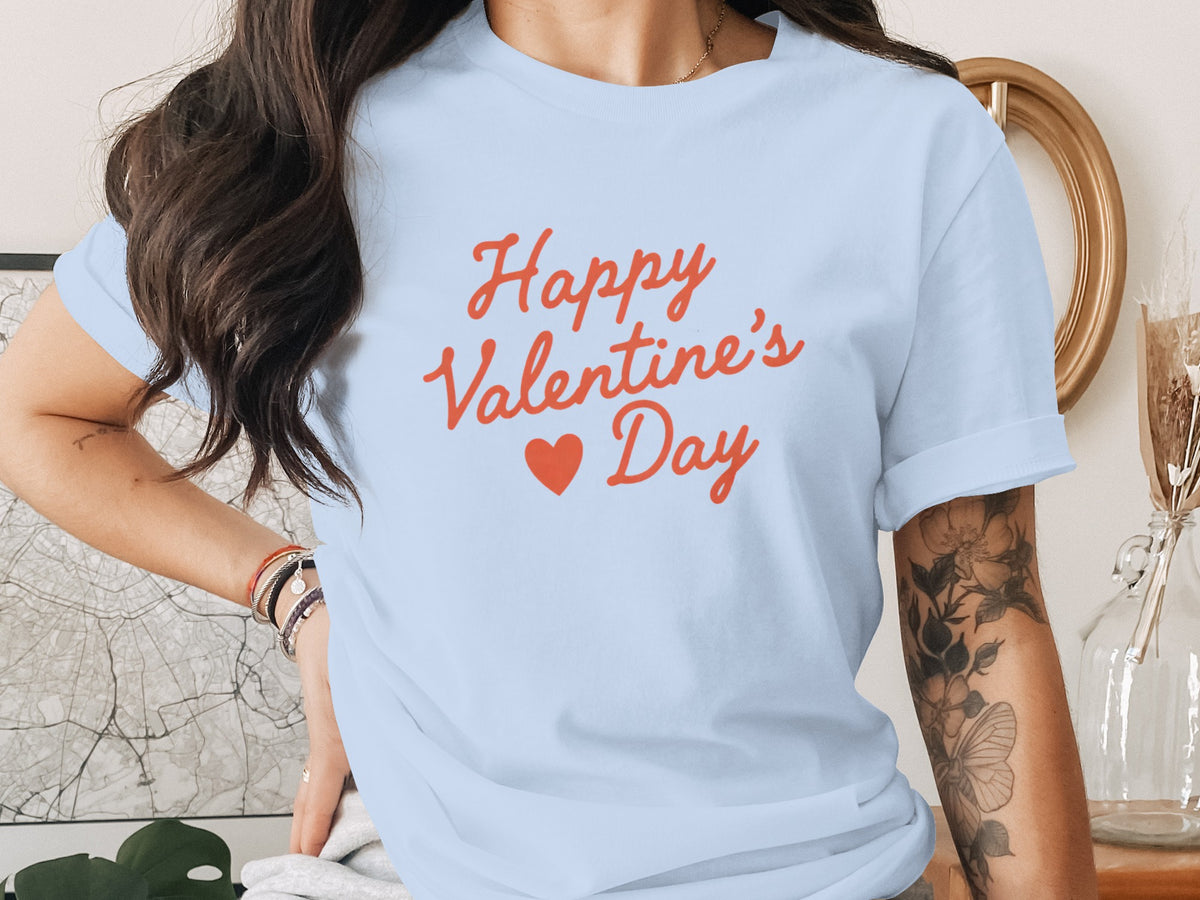 Light blue t-shirt with red text "Happy Valentine's Day" and a heart.
