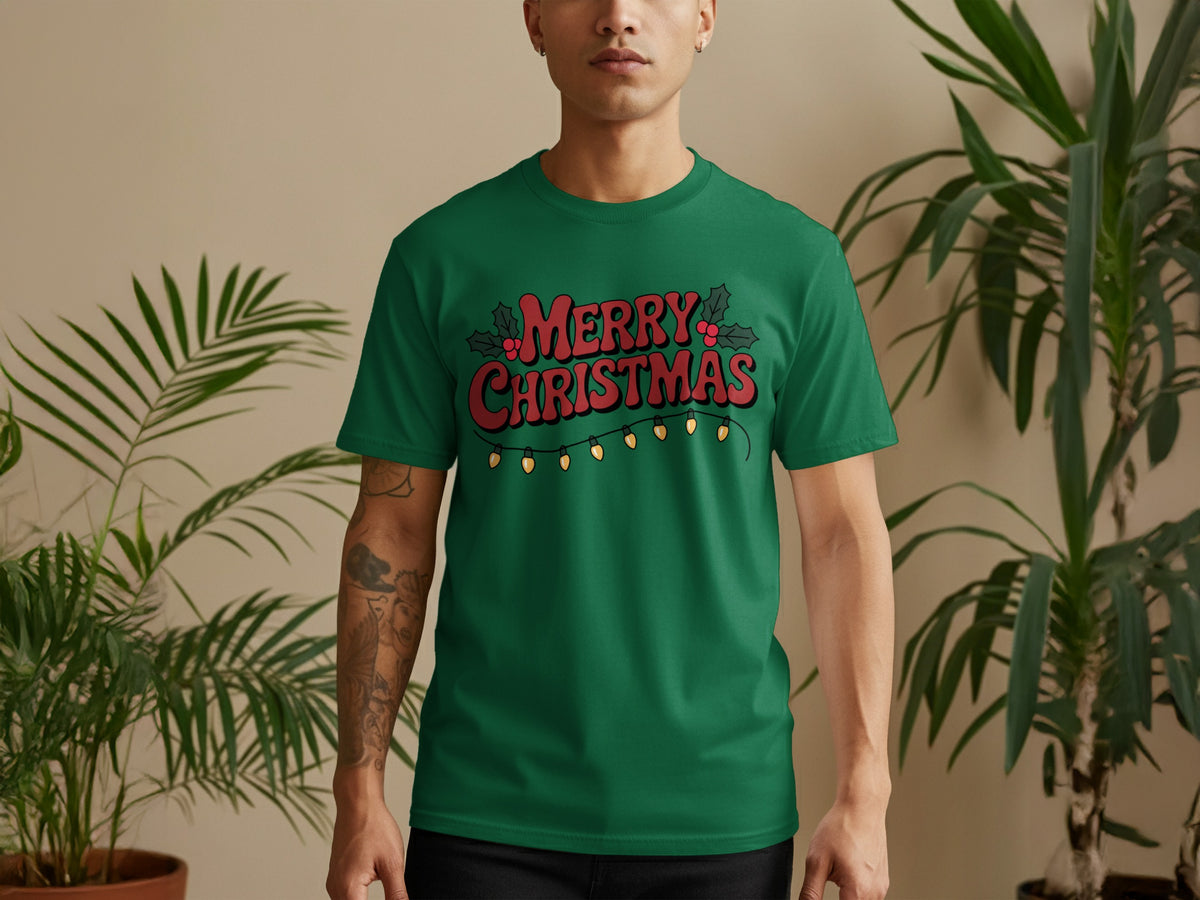 Green t-shirt with red "Merry Christmas" text and festive lights.