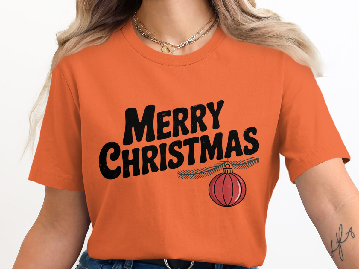 Orange t-shirt with "Merry Christmas" text and a festive ornament.