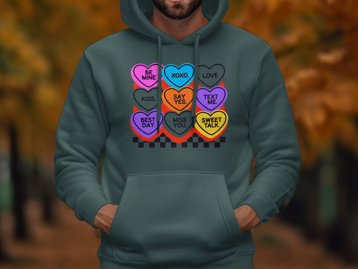 Hoodie with hearts saying "Be Mine", "XOXO", "Love", "Kiss", "Say Yes", "Text Me", "Best Day", "Miss You", "Sweet Talk".