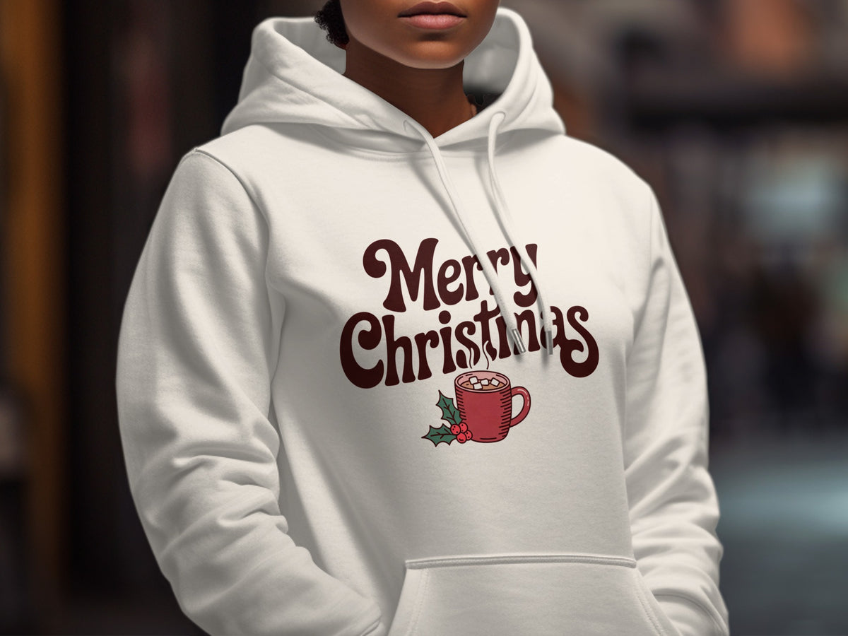 White hoodie with "Merry Christmas" text and hot chocolate mug graphic.