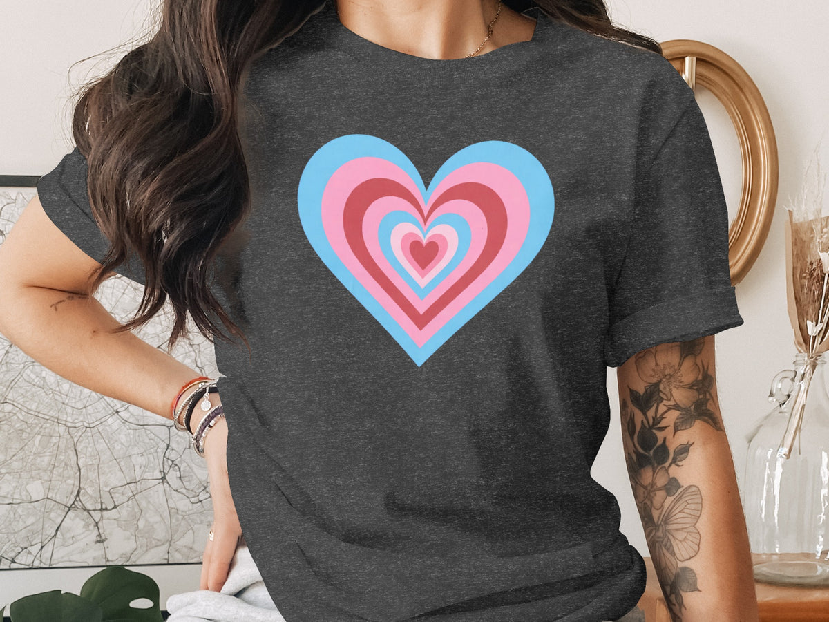 Dark grey t-shirt with concentric hearts in pink, blue, and red.