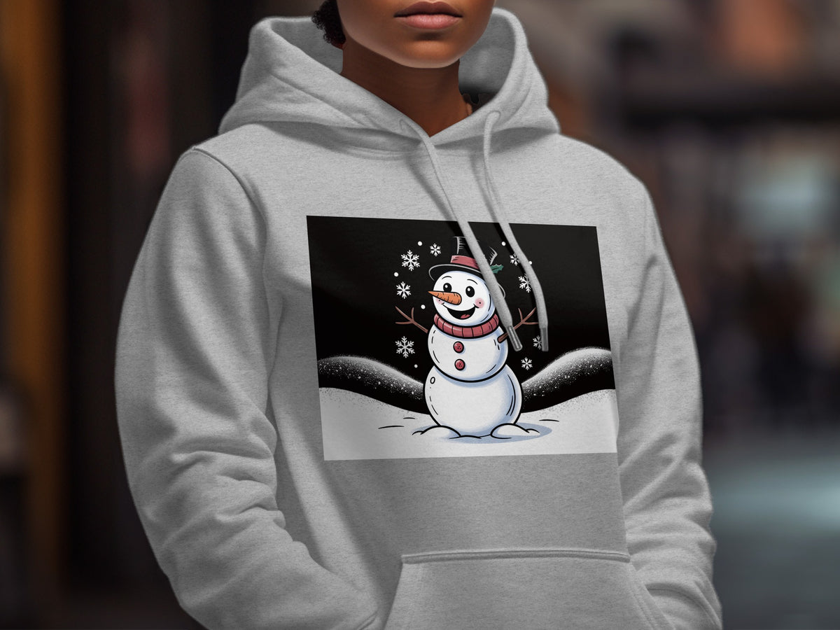A person wearing a grey hoodie featuring a graphic of a cartoon snowman surrounded by snowflakes.