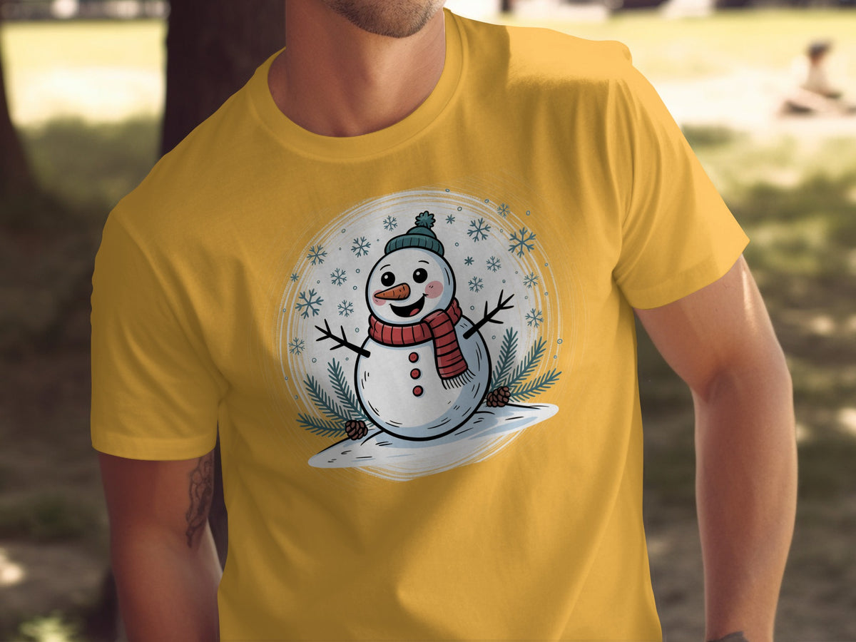 Yellow t-shirt featuring a smiling snowman with a scarf, hat, and snowflakes.