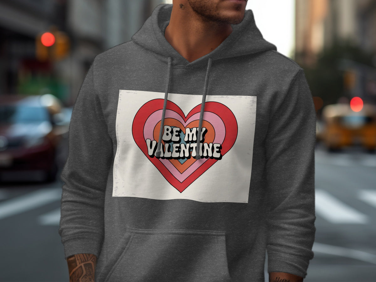 Dark grey hoodie with "Be My Valentine" text on a retro heart graphic.