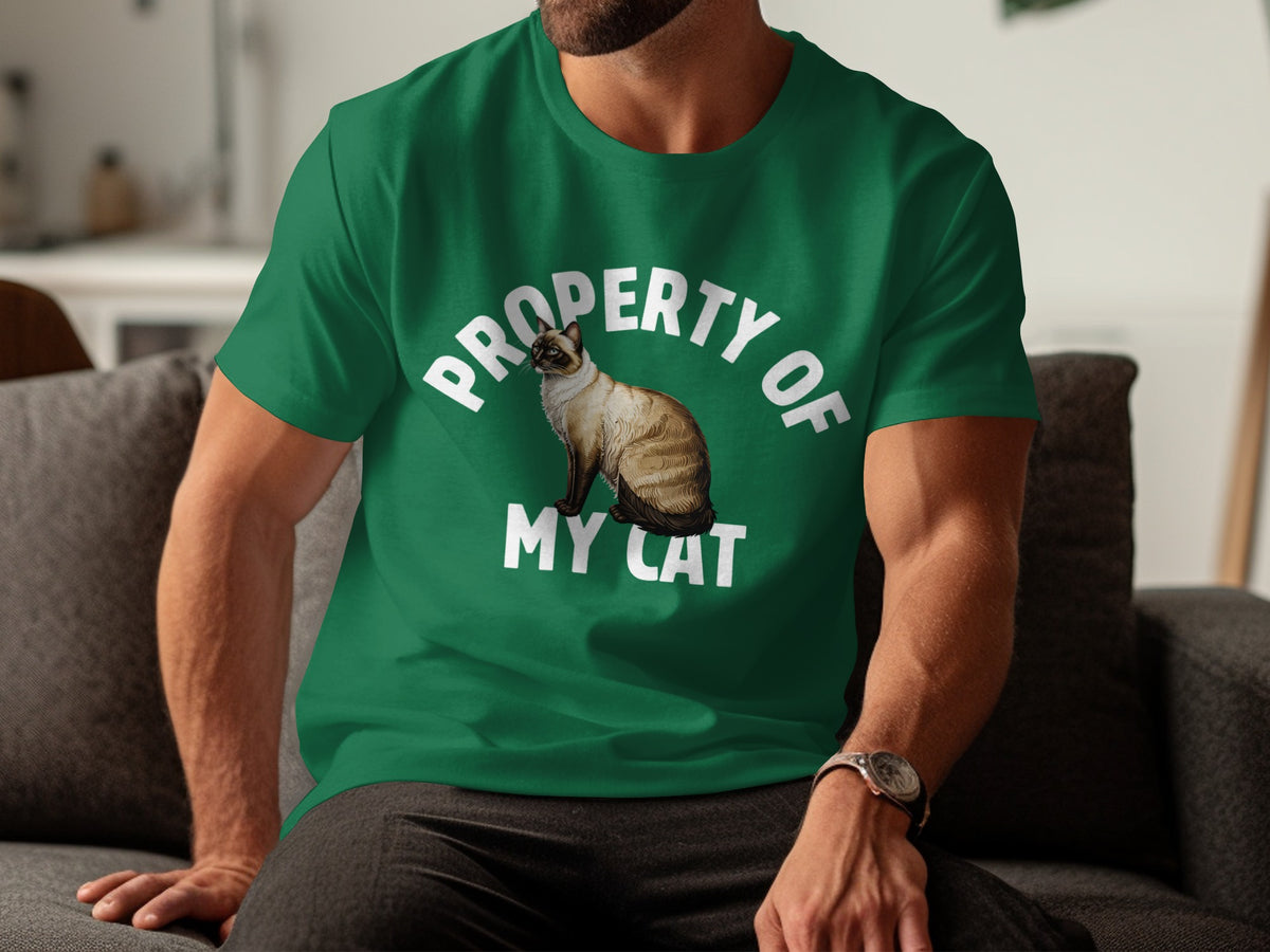 Green t-shirt with white text "PROPERTY OF MY CAT" and Siamese cat graphic.