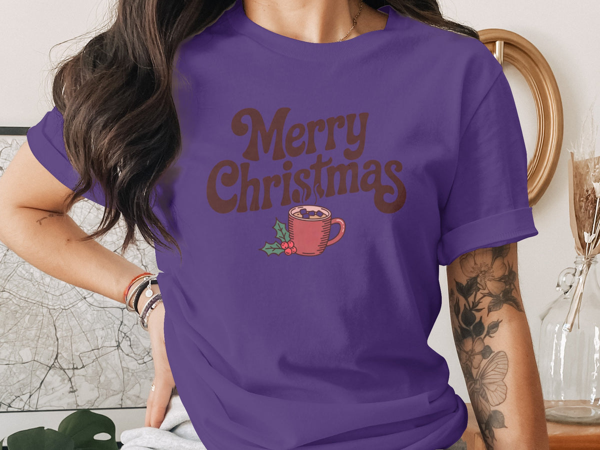 Purple t-shirt with brown "Merry Christmas" text and a hot cocoa mug.