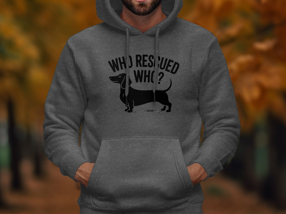 Dark grey hoodie with a black dachshund and text "WHO RESCUED WHO?"