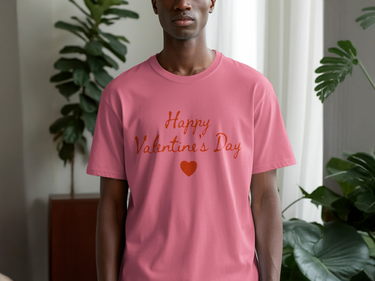 A person wearing a pink t-shirt with red text reading Happy Valentine's Day above a small heart.