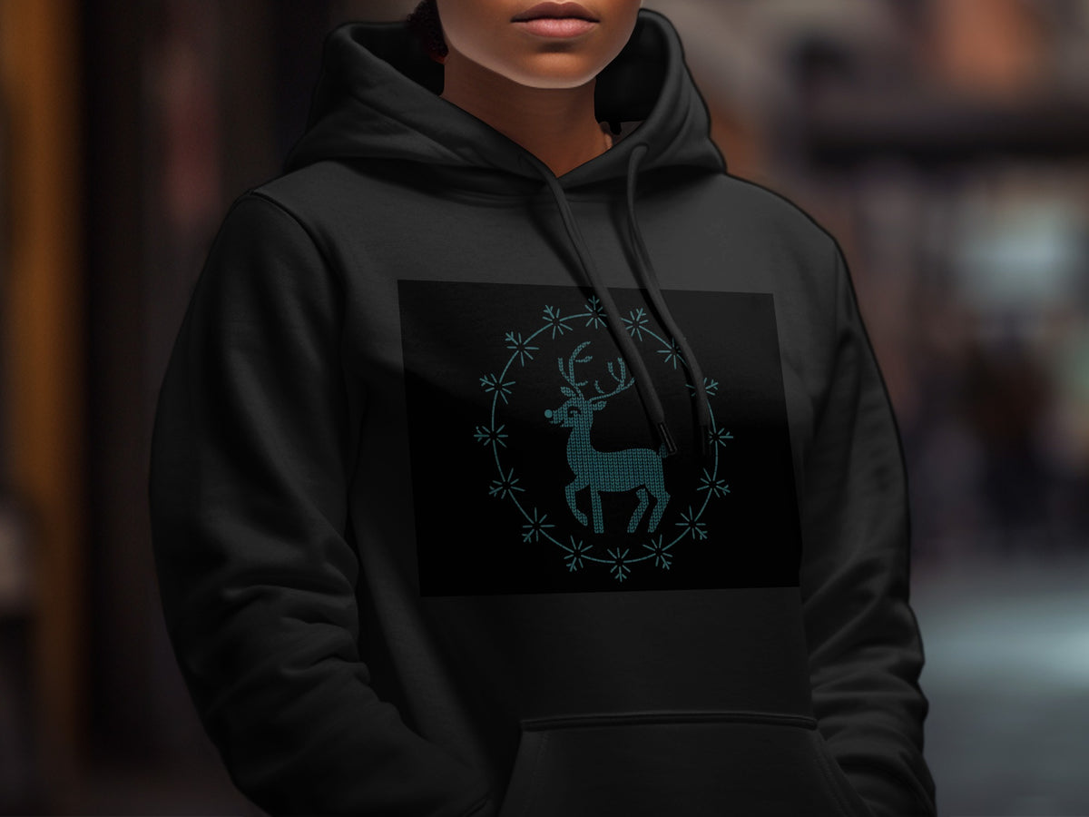 Black hoodie with teal pixelated deer and snowflake wreath graphic.