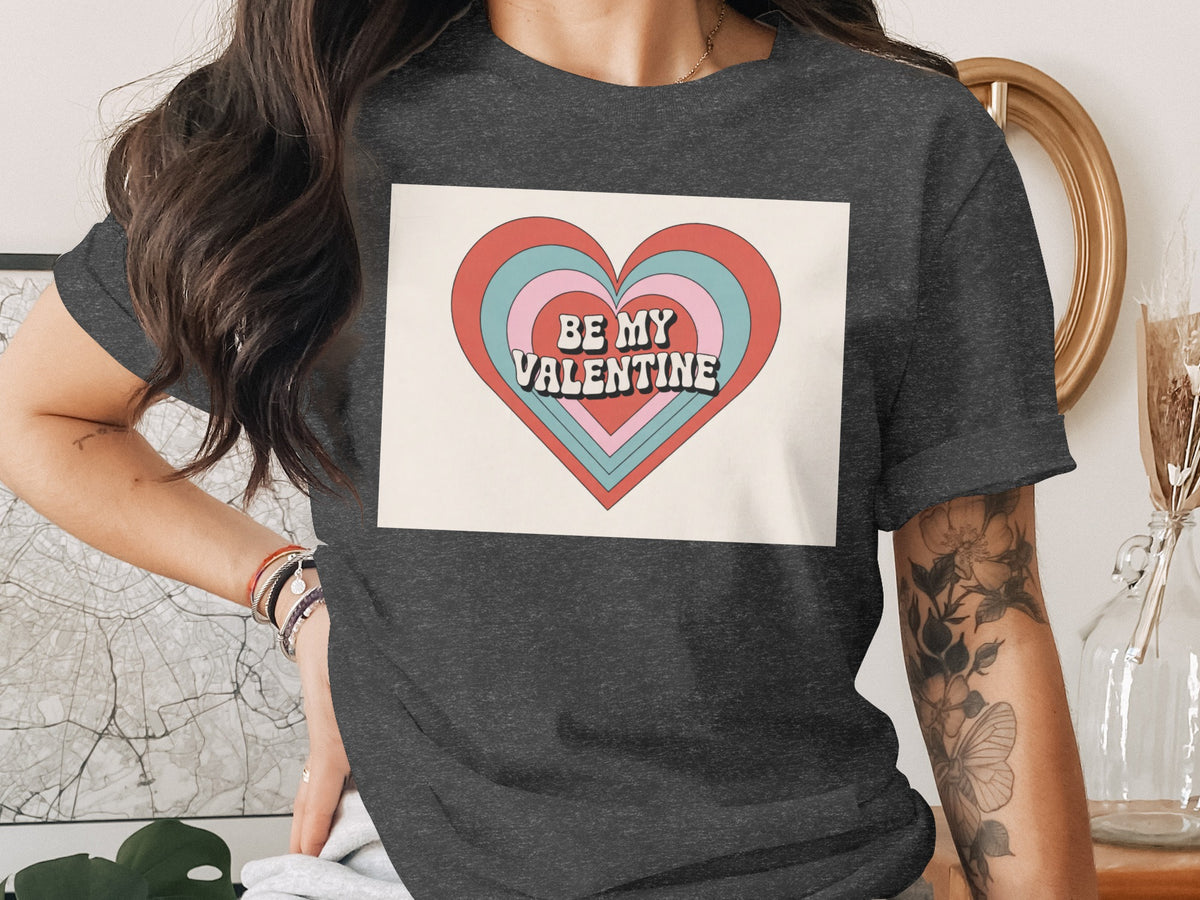 Dark t-shirt with retro "BE MY VALENTINE" heart graphic