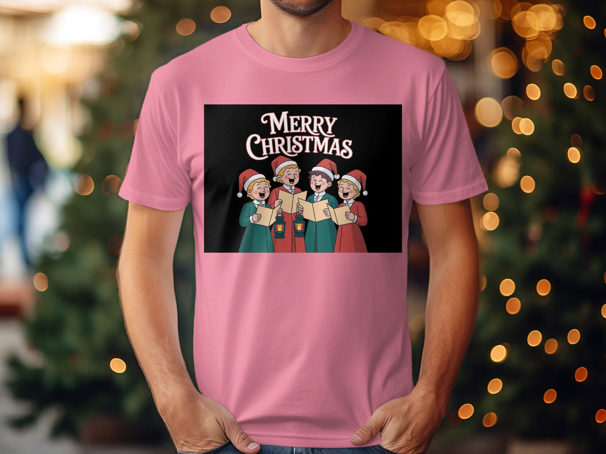 Pink t-shirt with cartoon carolers singing "Merry Christmas" against a black background.