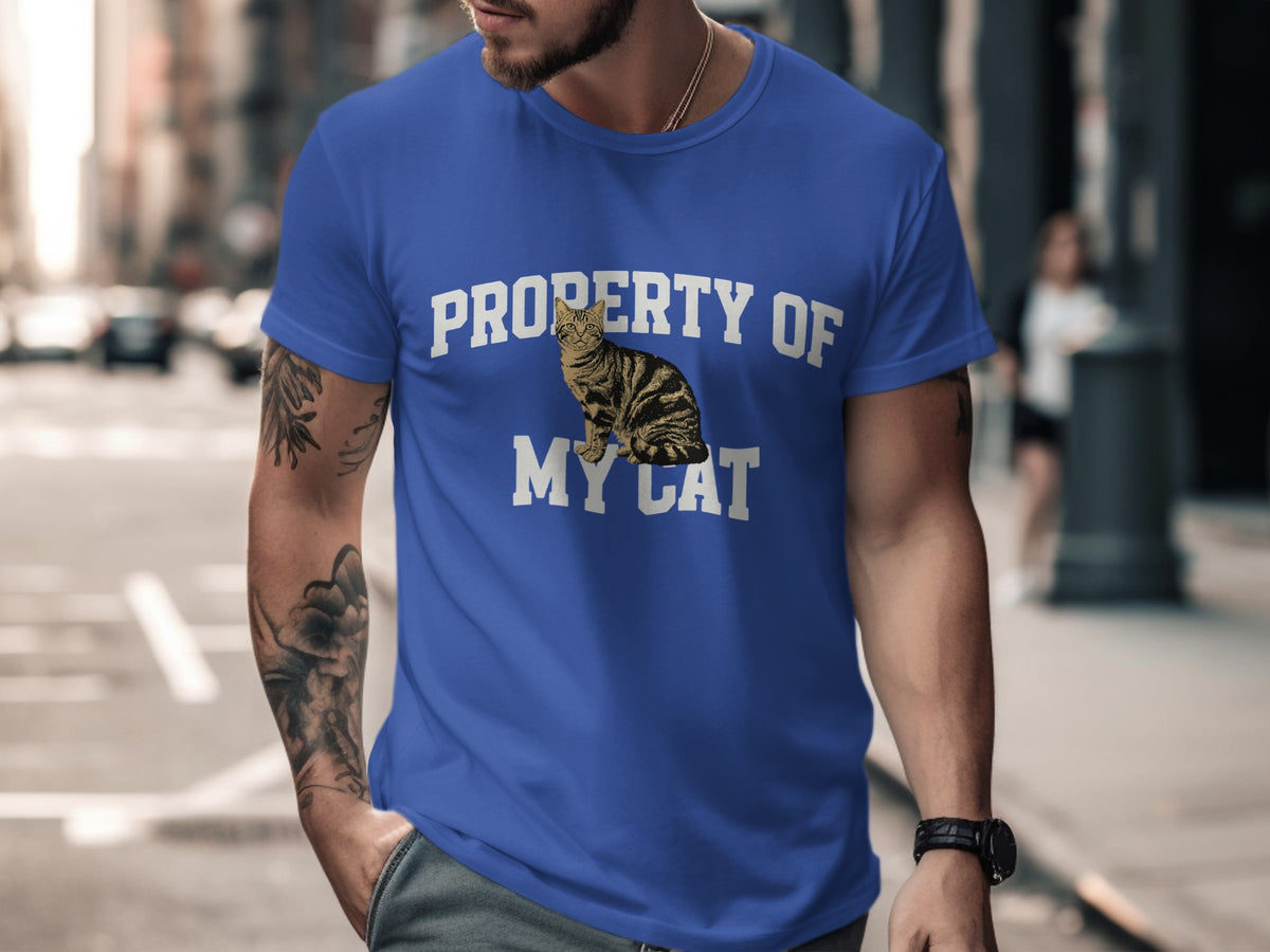 Blue t-shirt with "PROPERTY OF MY CAT" text and a tabby cat graphic.