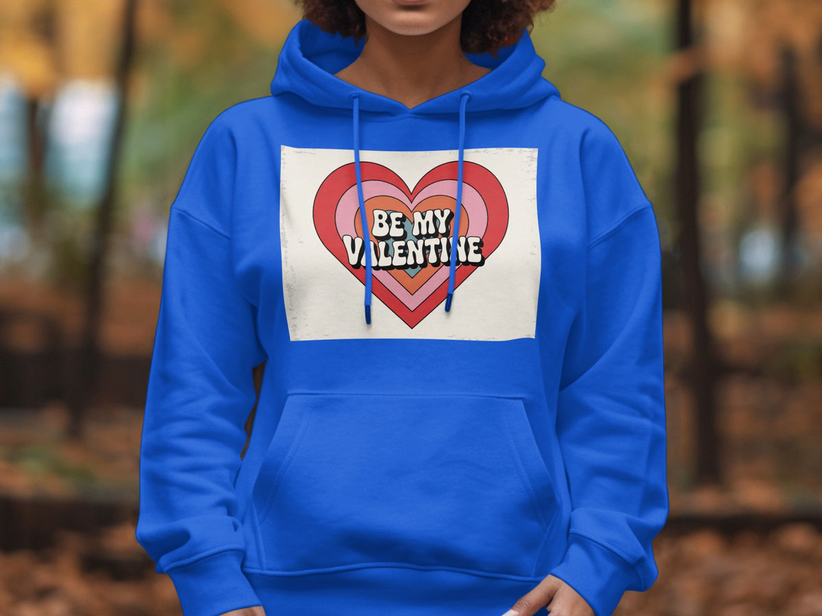 Royal blue hoodie with "Be My Valentine" text inside a retro heart graphic.