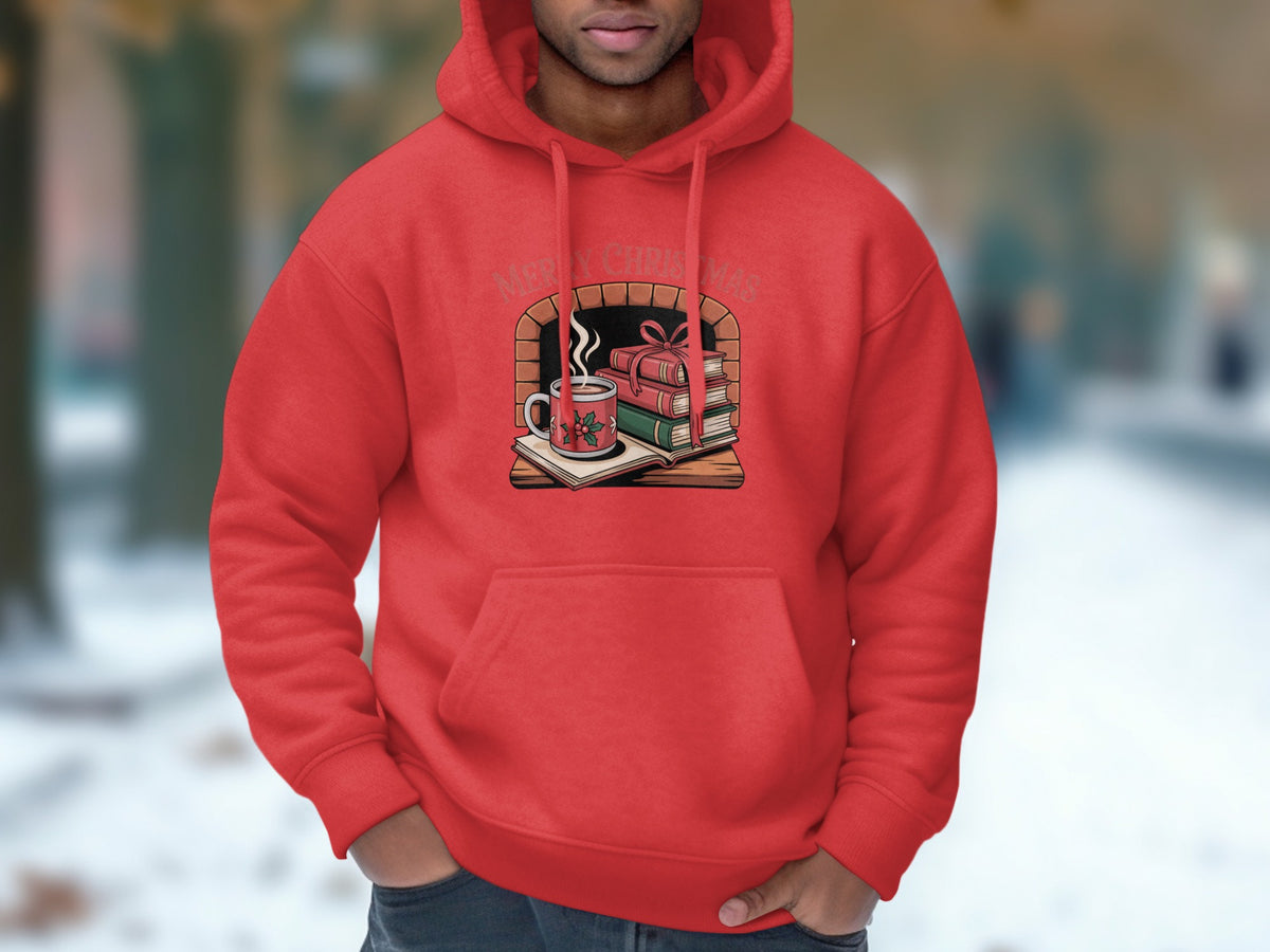 Red hoodie with "Merry Christmas" above a fireplace scene with books and hot cocoa.