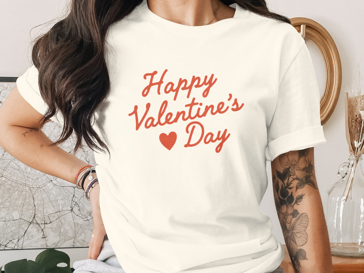 Cream t-shirt with red text "Happy Valentine's Day" and a heart.