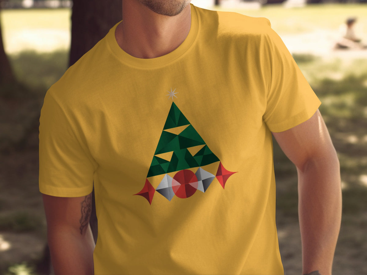 Yellow t-shirt with geometric green Christmas tree and red, white, and gray ornaments.