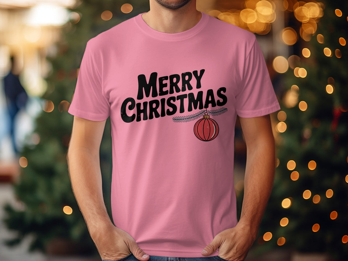 Pink t-shirt with "Merry Christmas" text and a Christmas ornament.