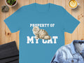 Blue t-shirt with "Property of My Cat" and a Persian cat graphic.