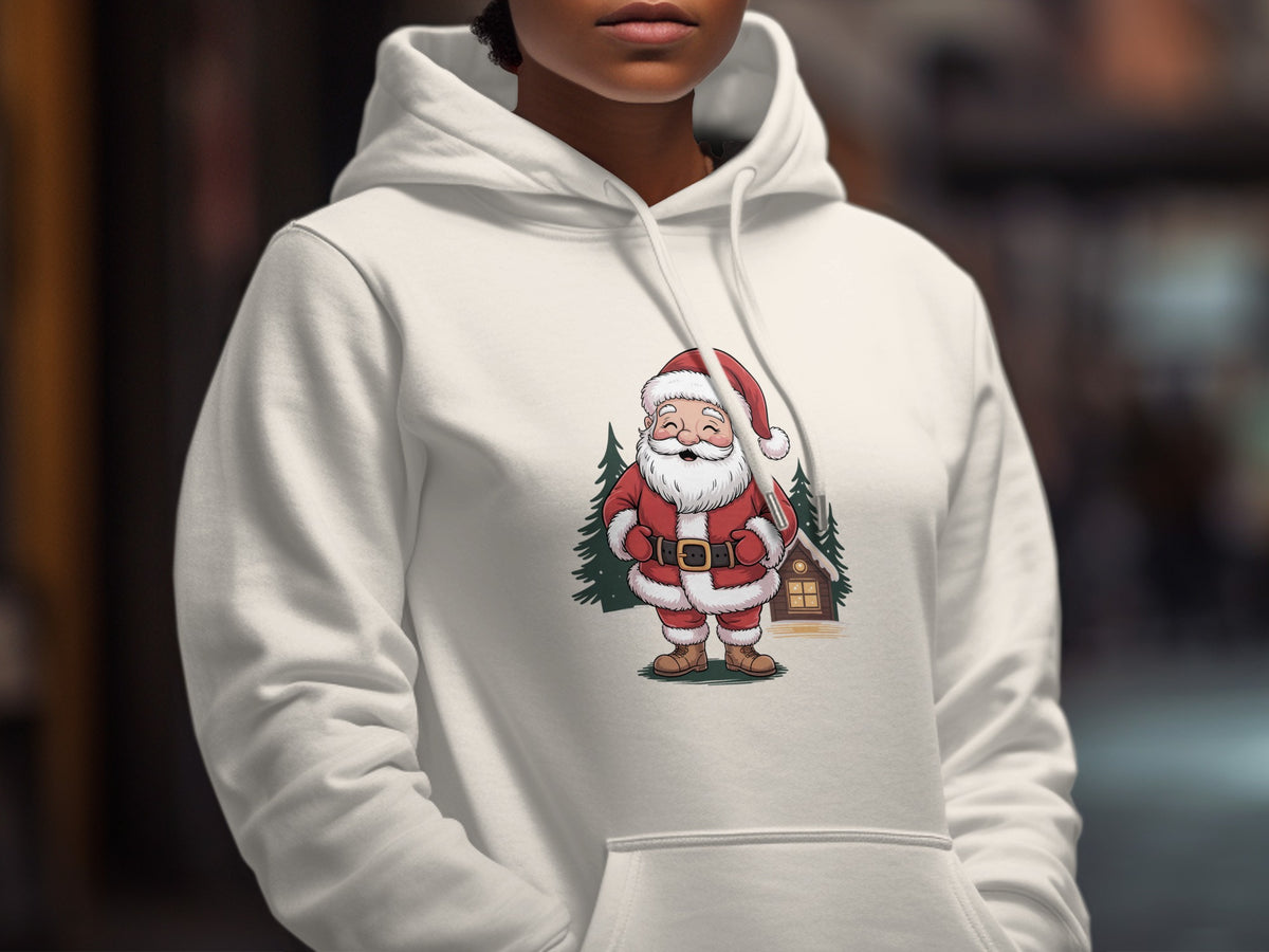 A person wearing a white hooded sweatshirt with a graphic of Santa Claus in front of trees and a cabin.