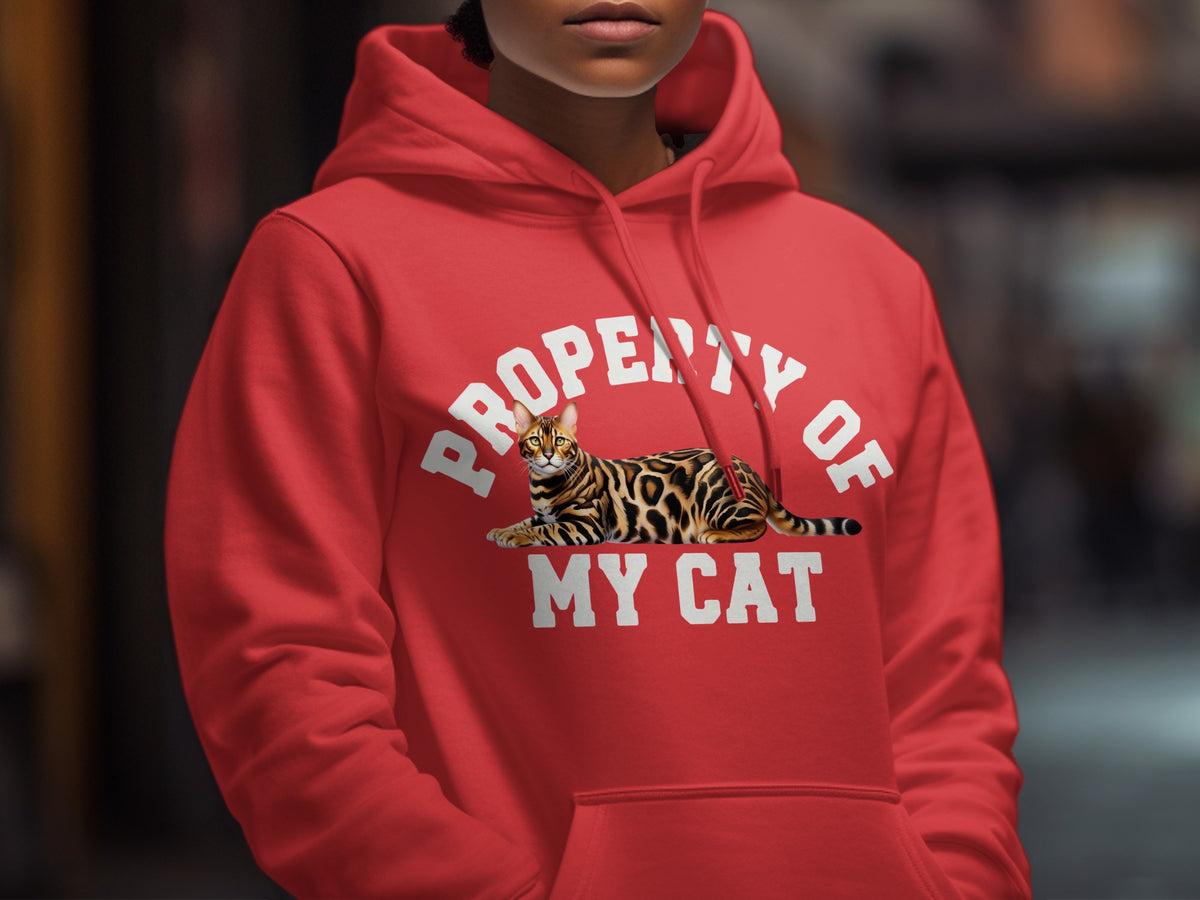 Red hoodie with white text "PROPERTY OF MY CAT" and a Bengal cat graphic.