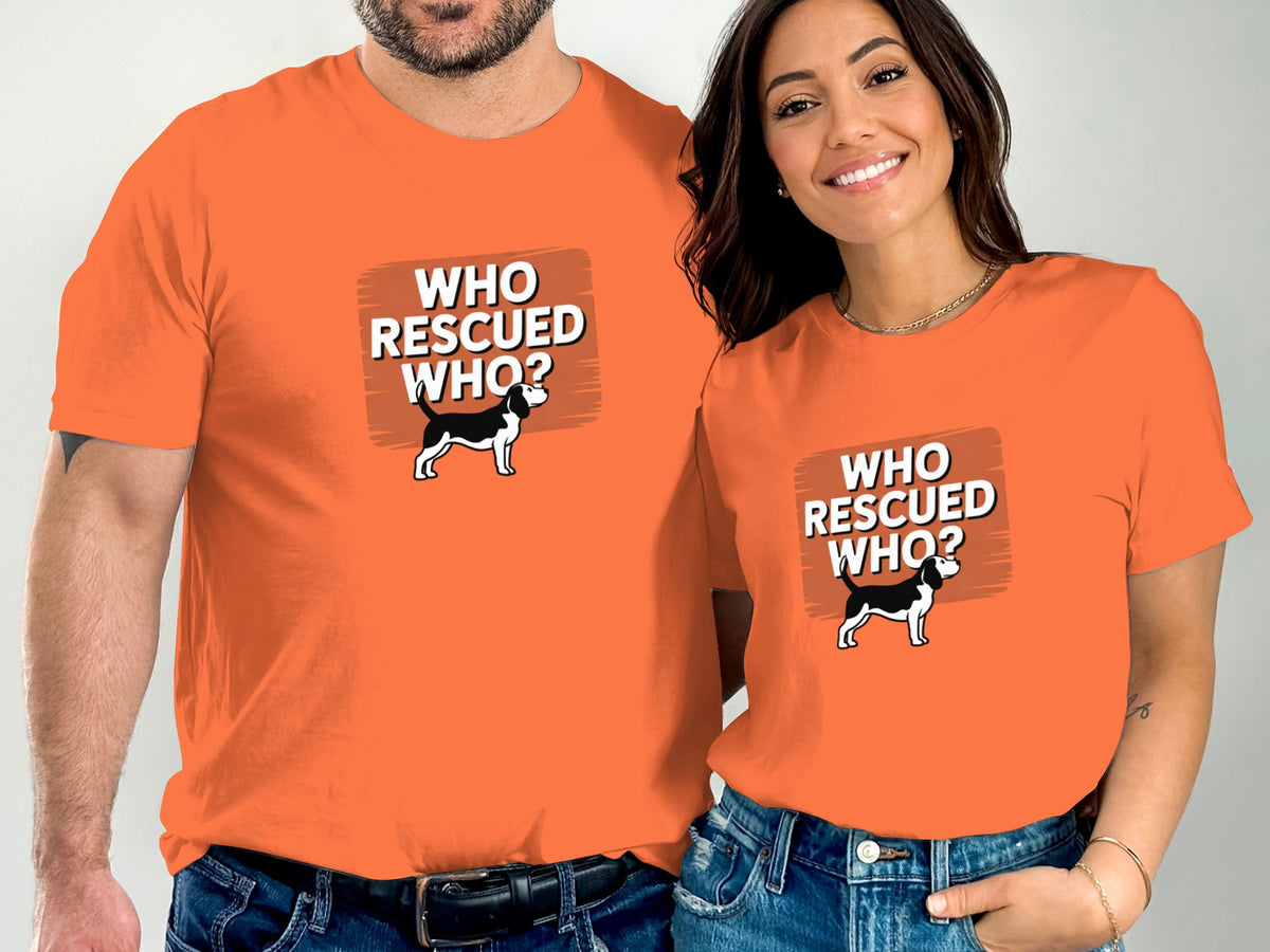 Two people wear orange t-shirts with "WHO RESCUED WHO?" and a beagle graphic.