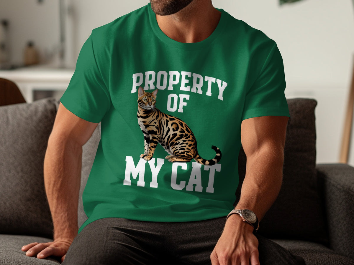 Green t-shirt with "PROPERTY OF MY CAT" text and a Bengal cat illustration.