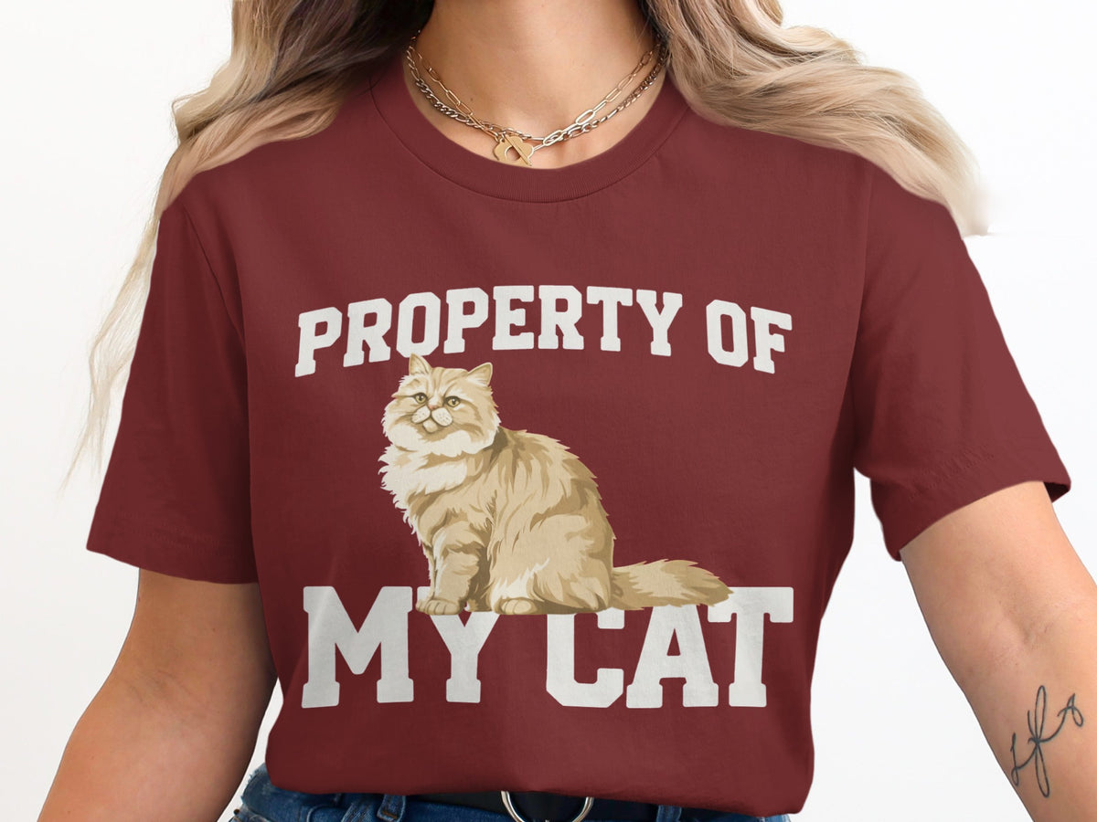 Maroon t-shirt with "Property of My Cat" text and fluffy cat graphic.
