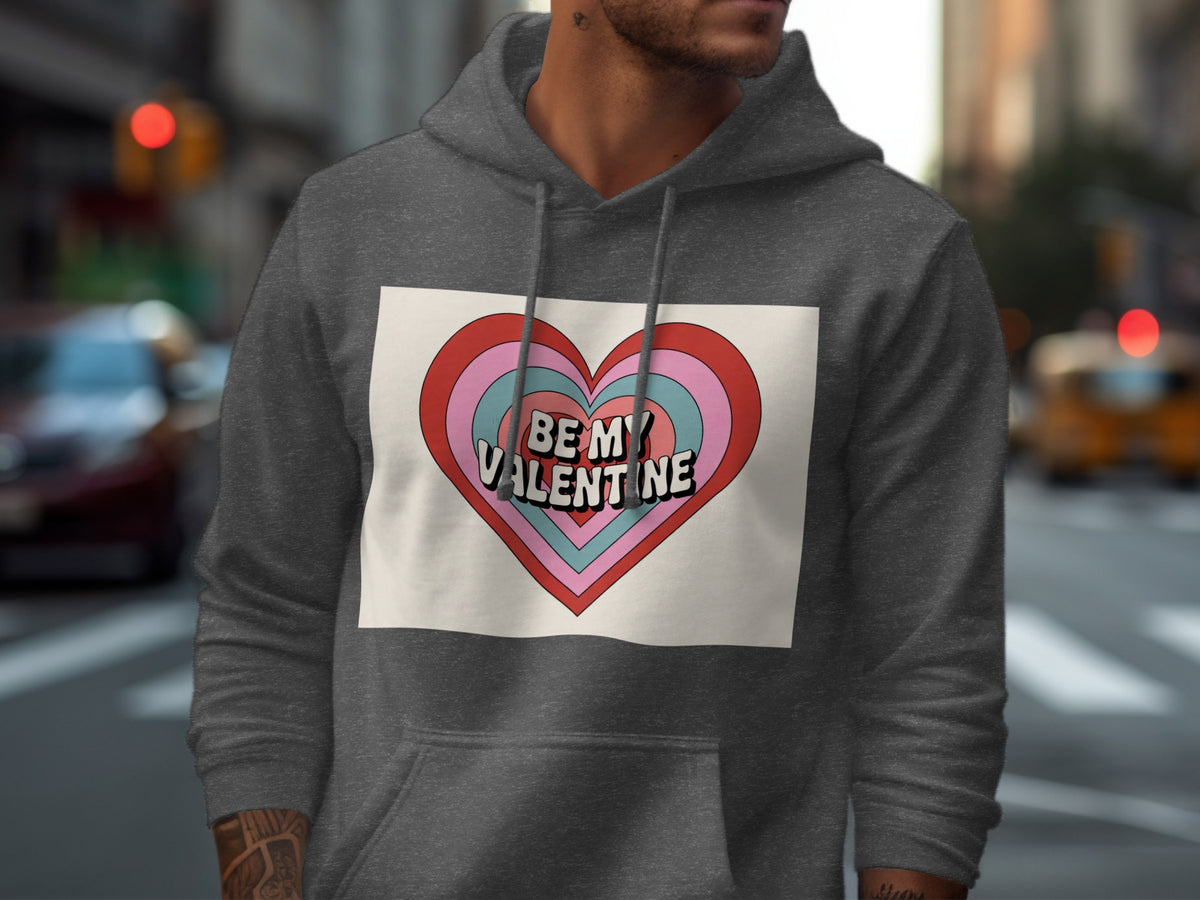 Dark grey hoodie with a heart graphic that reads "BE MY VALENTINE".