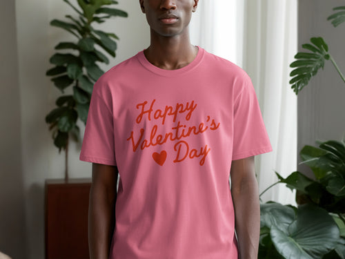 Pink t-shirt with red "Happy Valentine's Day" text and a heart.