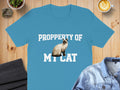 Turquoise t-shirt with white text "PROPPERTY OF MY CAT" and a siamese cat graphic.