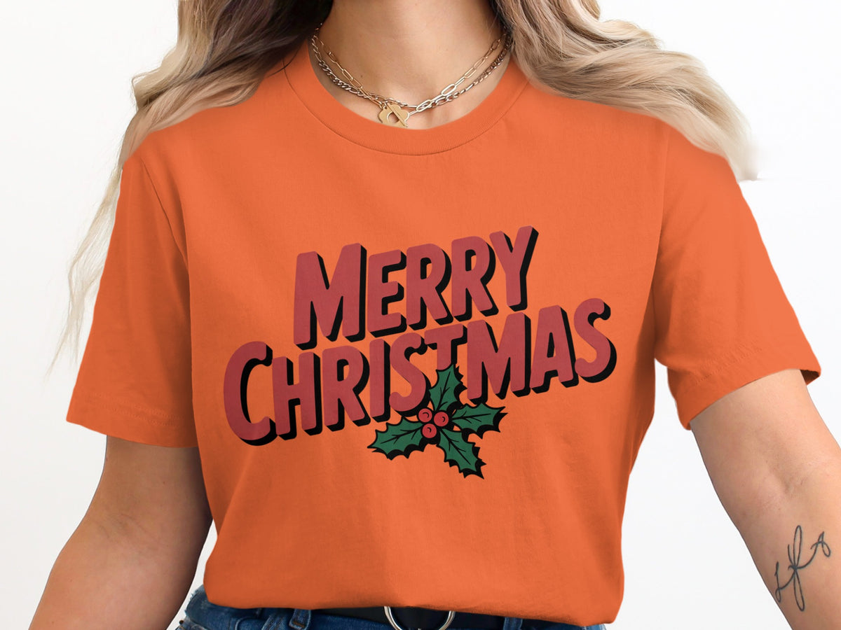 Orange t-shirt with red "Merry Christmas" text and holly.