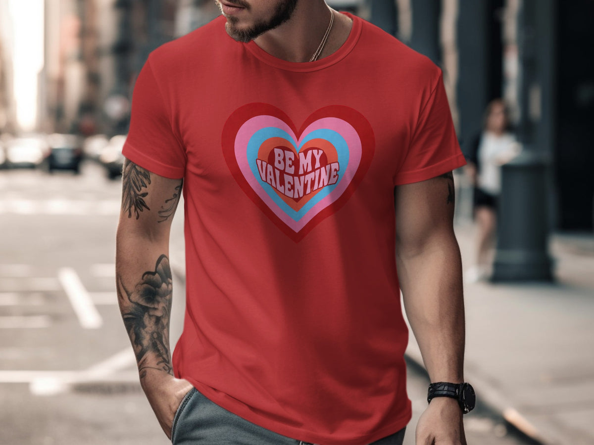 Red t-shirt with concentric heart graphic and "BE MY VALENTINE" text.