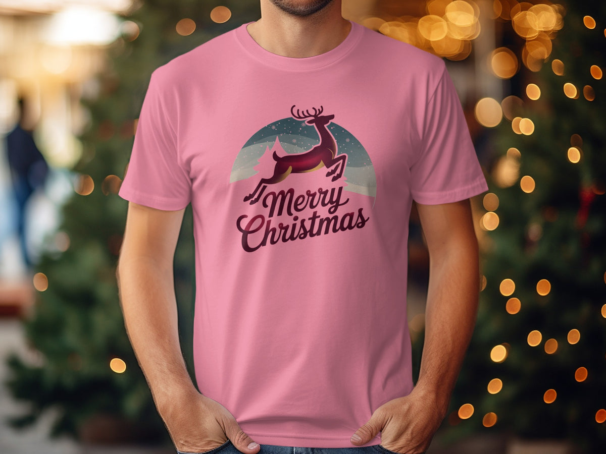 Pink t-shirt with a jumping reindeer and "Merry Christmas" text.
