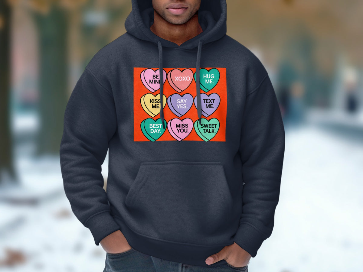 Dark grey hoodie with nine candy hearts featuring Valentine's Day messages.