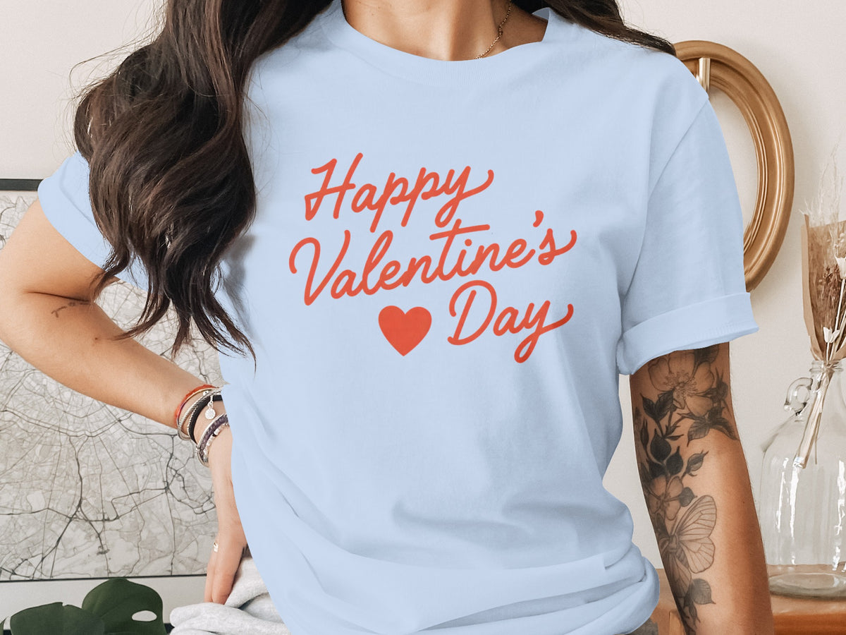 Light blue t-shirt with red text "Happy Valentine's Day" and a heart.