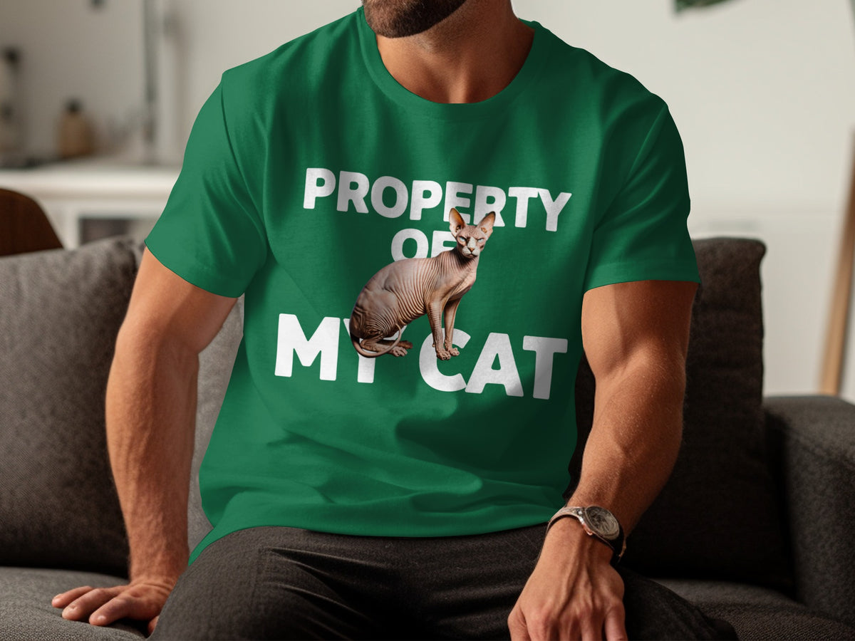 Green t-shirt with "PROPERTY OF MY CAT" and a hairless cat graphic.
