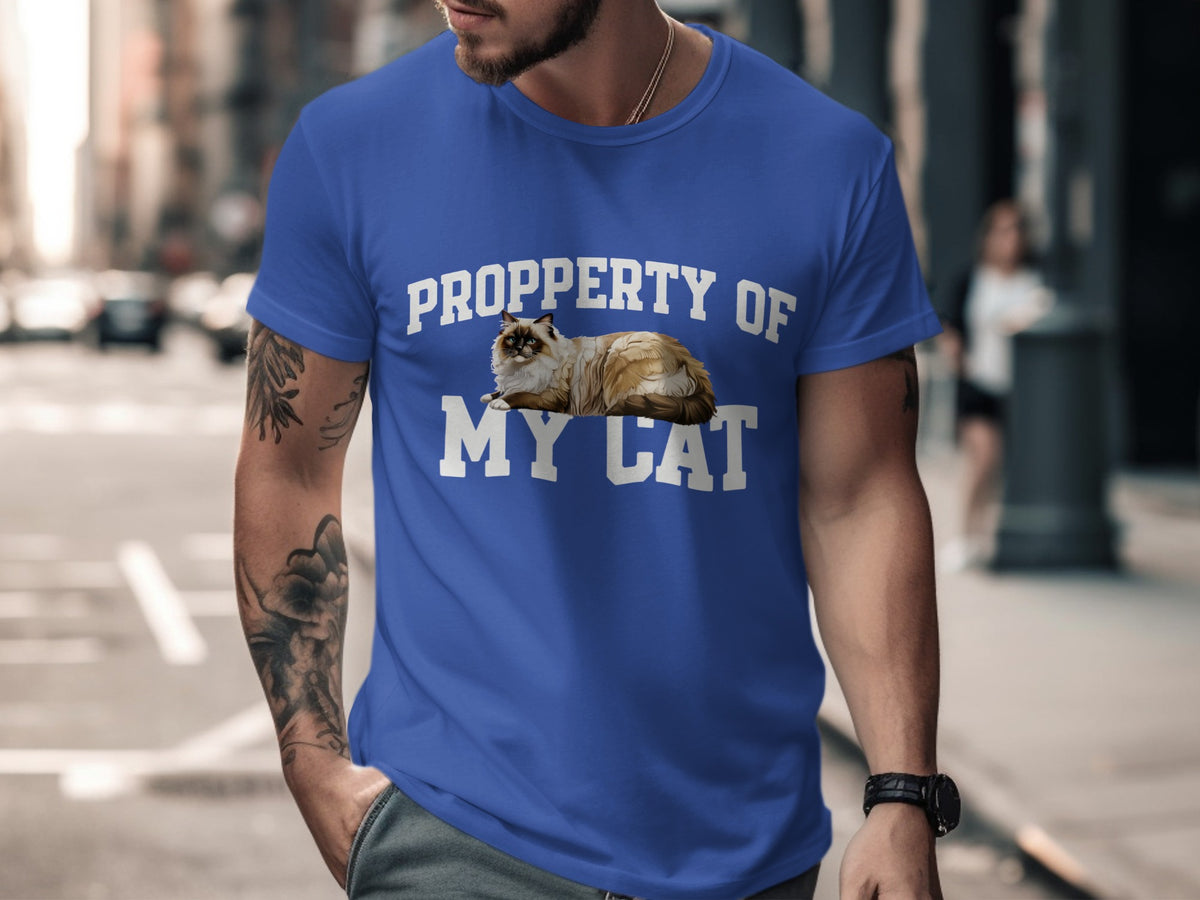 Blue t-shirt with white text "PROPPERTY OF MY CAT" and a fluffy cat graphic.