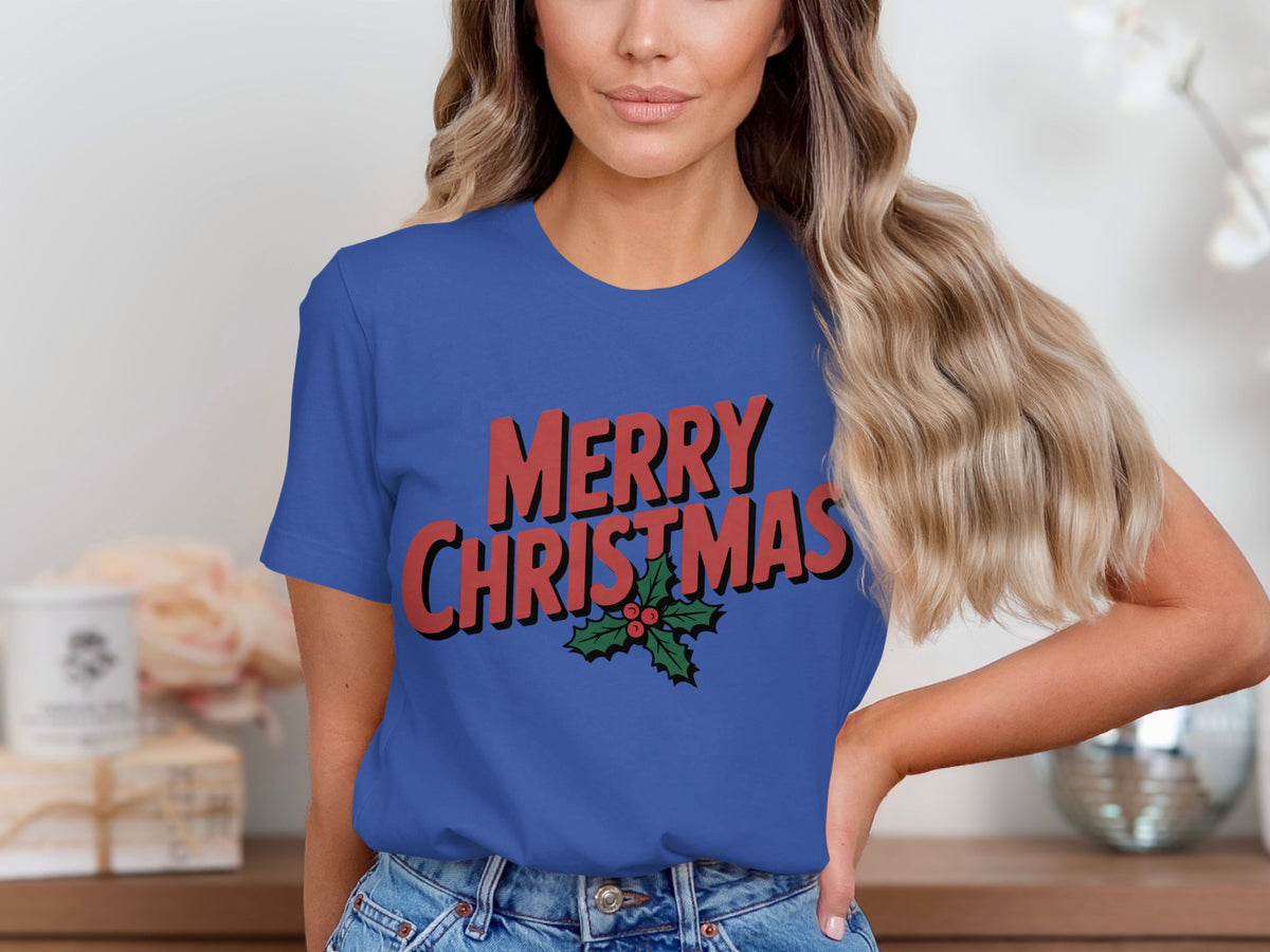Royal blue t-shirt with red "MERRY CHRISTMAS" text and holly graphic.
