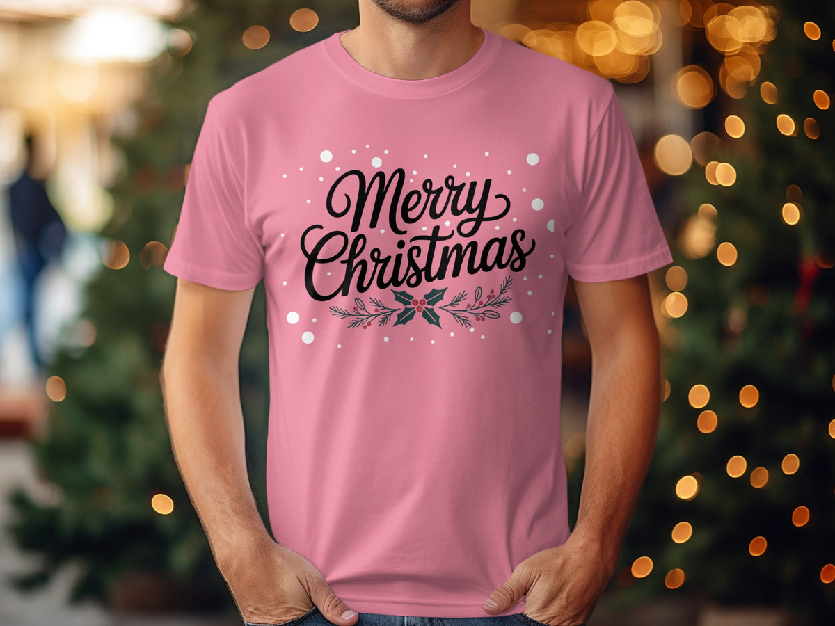 Pink t-shirt with "Merry Christmas" text and holly graphic.