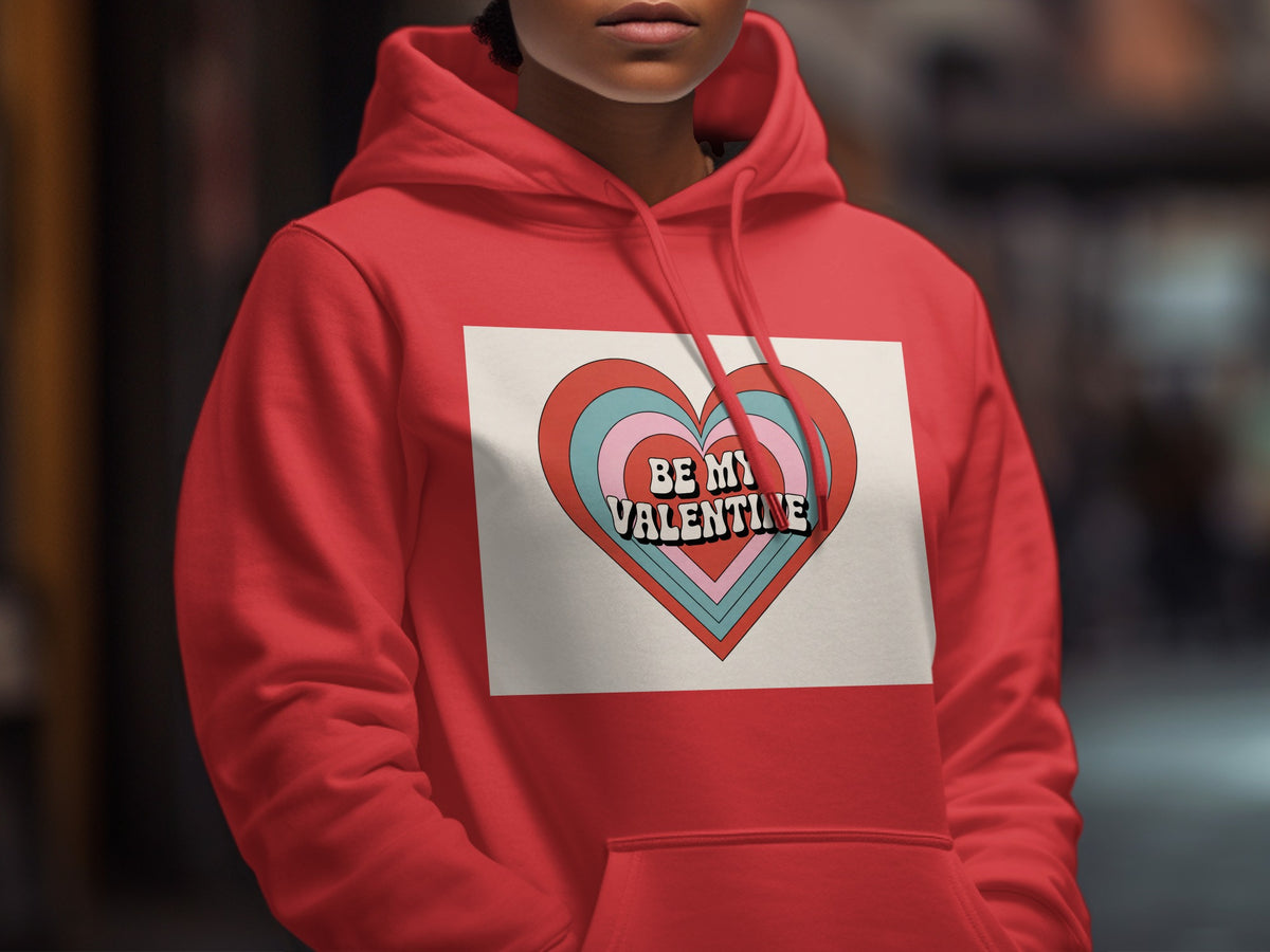 Red hoodie with a layered heart graphic reading "Be My Valentine".