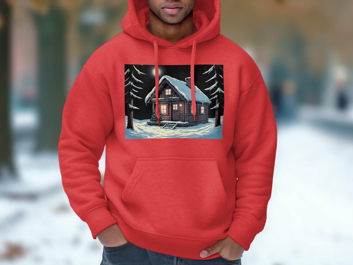 A person wearing a vibrant red hoodie featuring a graphic of a snowy winter cabin.