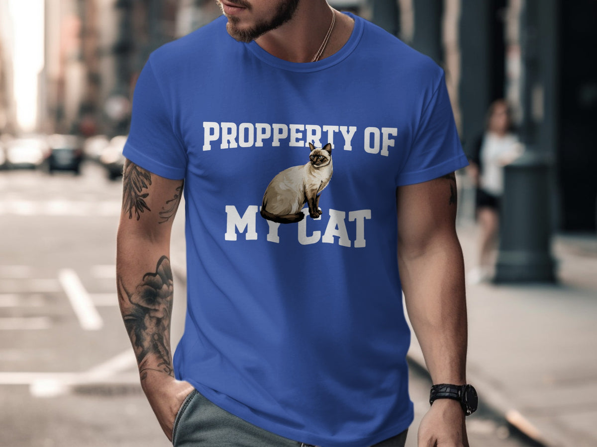 Blue t-shirt with white text "PROPPERTY OF MY CAT" and a Siamese cat illustration.