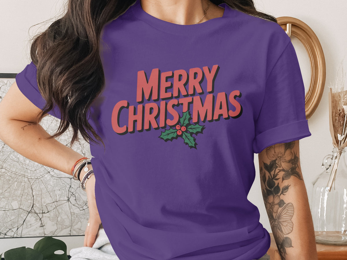 Purple t-shirt with "Merry Christmas" text and holly design.