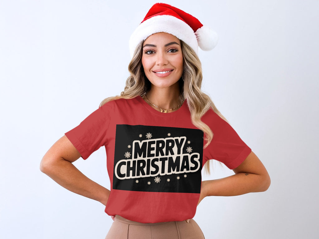 Woman wearing a red t-shirt with "MERRY CHRISTMAS" and snowflakes.
