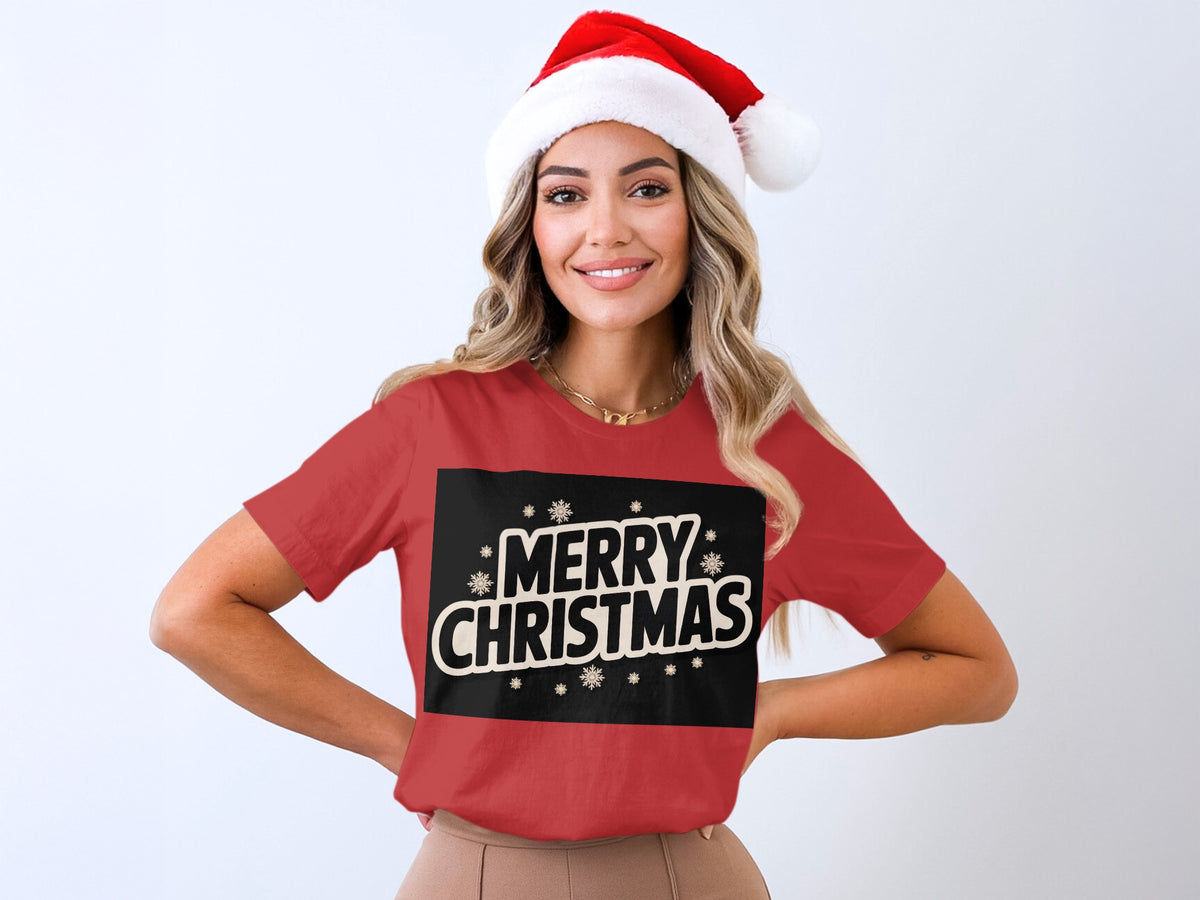 Woman wearing a red t-shirt with "MERRY CHRISTMAS" and snowflakes.