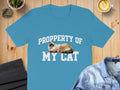 Aqua t-shirt with "PROPERRTY OF MY CAT" and a ragdoll cat graphic.