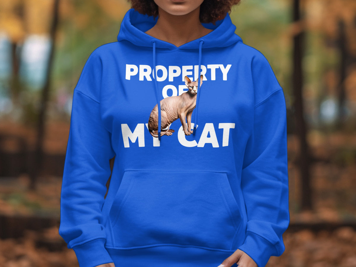 Blue hoodie with white text "PROPERTY OF MY CAT" and a Sphynx cat image.